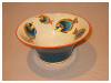 A Bali stoneware deep circular bowl, decorated with floating fishes in sea - second view.